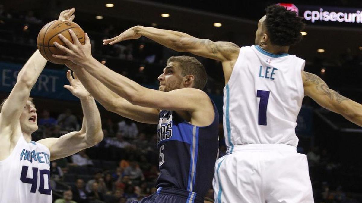 Chandler Parsons was effective inside and outside and led the Mavericks with 24 points.