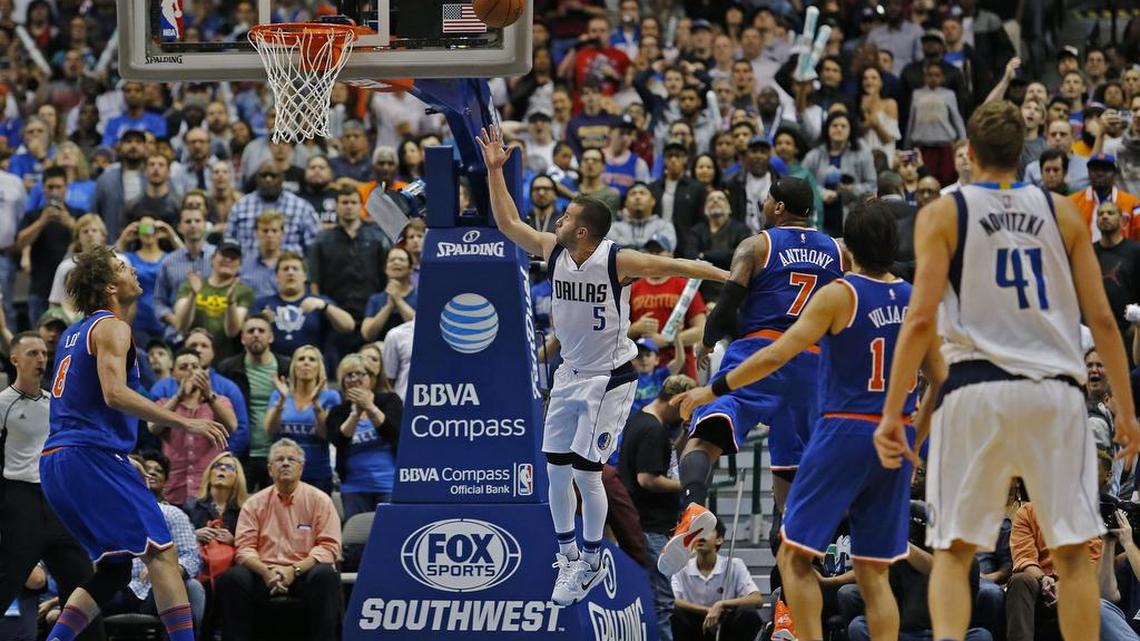 Dallas Mavericks guard J.J. Barea scores on a floating shot to give the Mavs a one-point lead with 49 seconds on the clock. The Mavericks won 91-89.