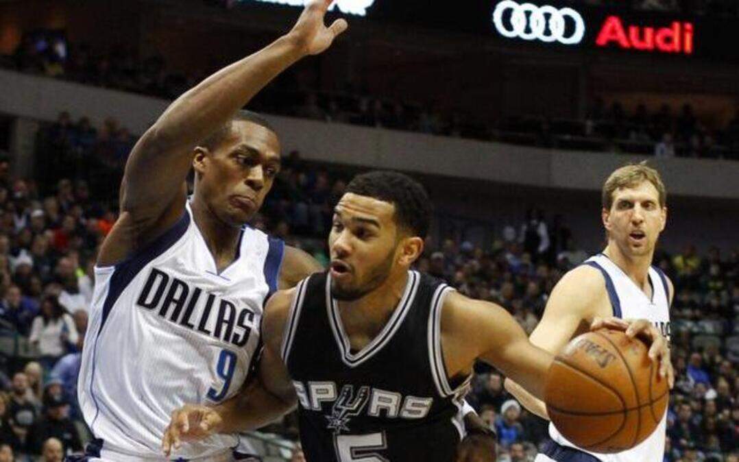 The Spurs’ Cory Joseph drives against Rajon Rondo, who was acquired Thursday from Boston.<252><252><137>San Antonio Spurs guard Cory Joseph (5) drives on Dallas Mavericks guard Rajon Rondo (9) during the first half of a NBA basketball game at American Airlines Center in Dallas, TX on Dec. 20, 2014. Special to S-T/Ray Carlin.<252><137>