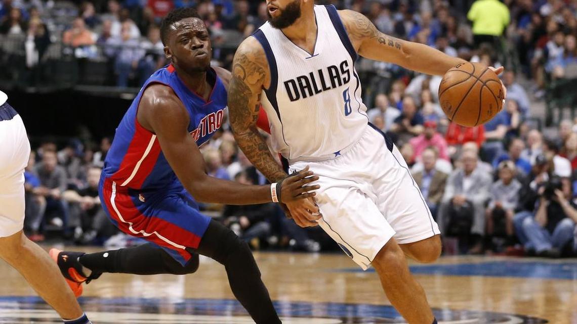 Mavericks point guard Deron Williams, right, has been slowed by a sports hernia, but is playing through the pain.