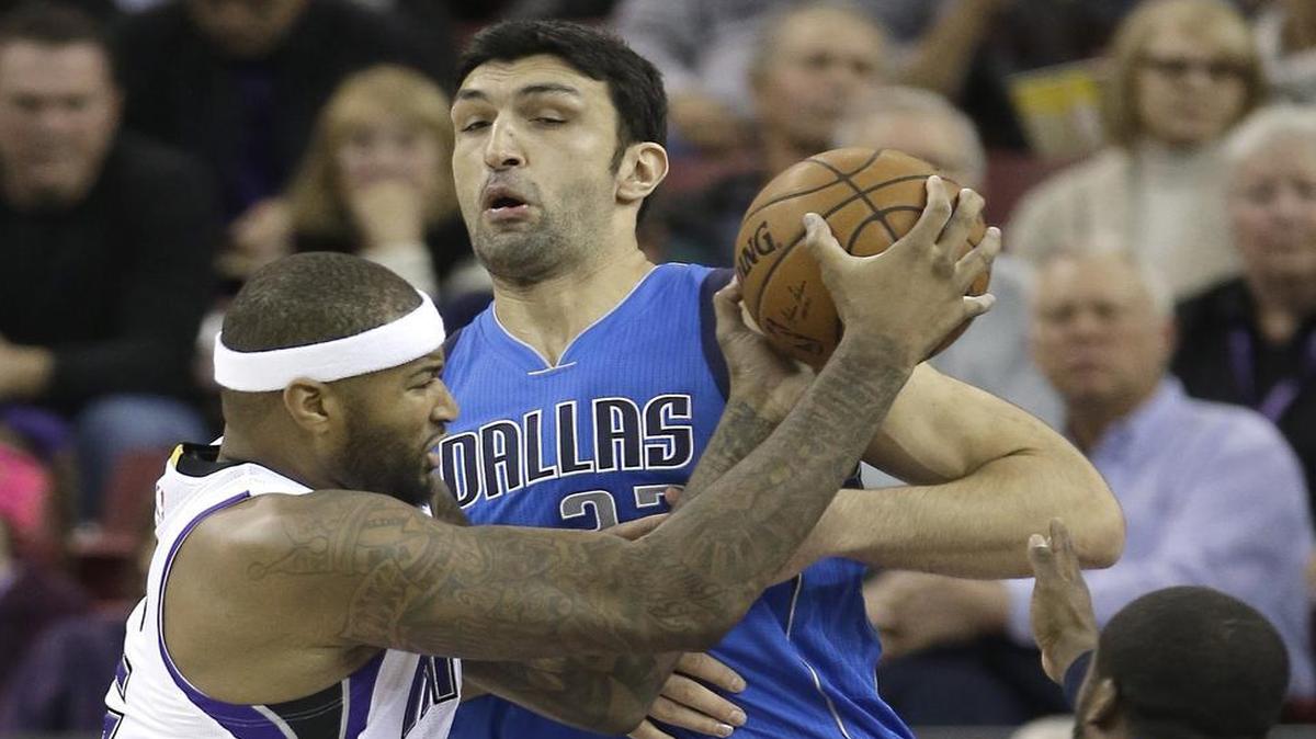 DeMarcus Cousins, left, could not be contained Nov. 30 in Sacramento when he had 31 points, nine rebounds and six assists in a 112-98 victory over Zaza Pachulia and the Mavericks. The teams meet again Tuesday in Dallas.