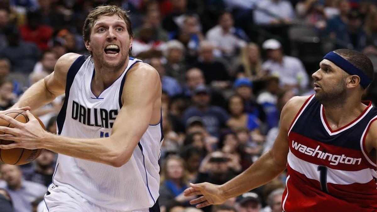 Dirk Nowiztki, left, said the Mavericks did not play well defensively against Jared Dudley and the Wizards on Saturday night.