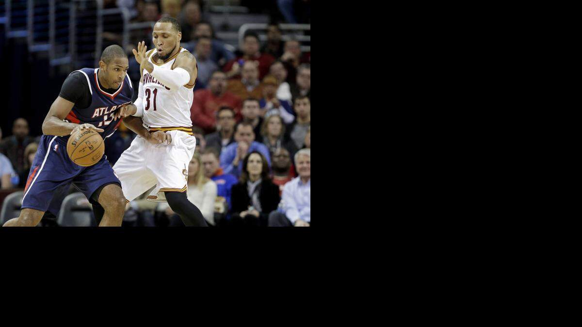 
Former Maverick Shawn Marion, right, is averaging 5.9 points and 3.7 rebounds a game in his first season with Cleveland.


