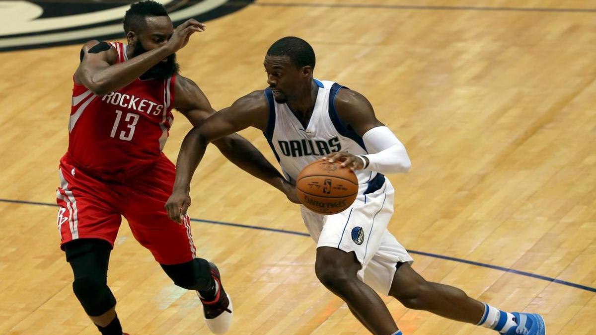 Forward Harrison Barnes, right, leads the Dallas Mavericks this season with a 20.4 scoring average. Barnes guides his new team against his former team, Golden State, on Friday night in Oakland, Calif.