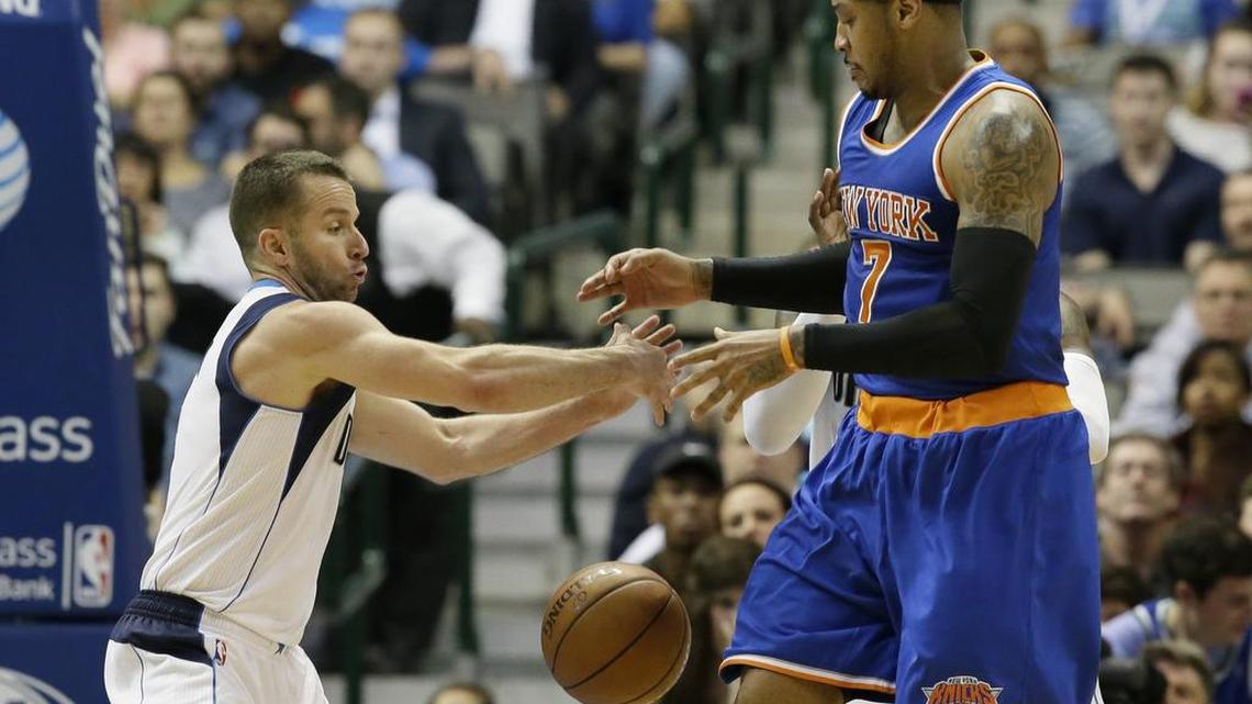Dallas Mavericks guard J.J. Barea (5) forces the ball loose against New York Knicks forward Carmelo Anthony.