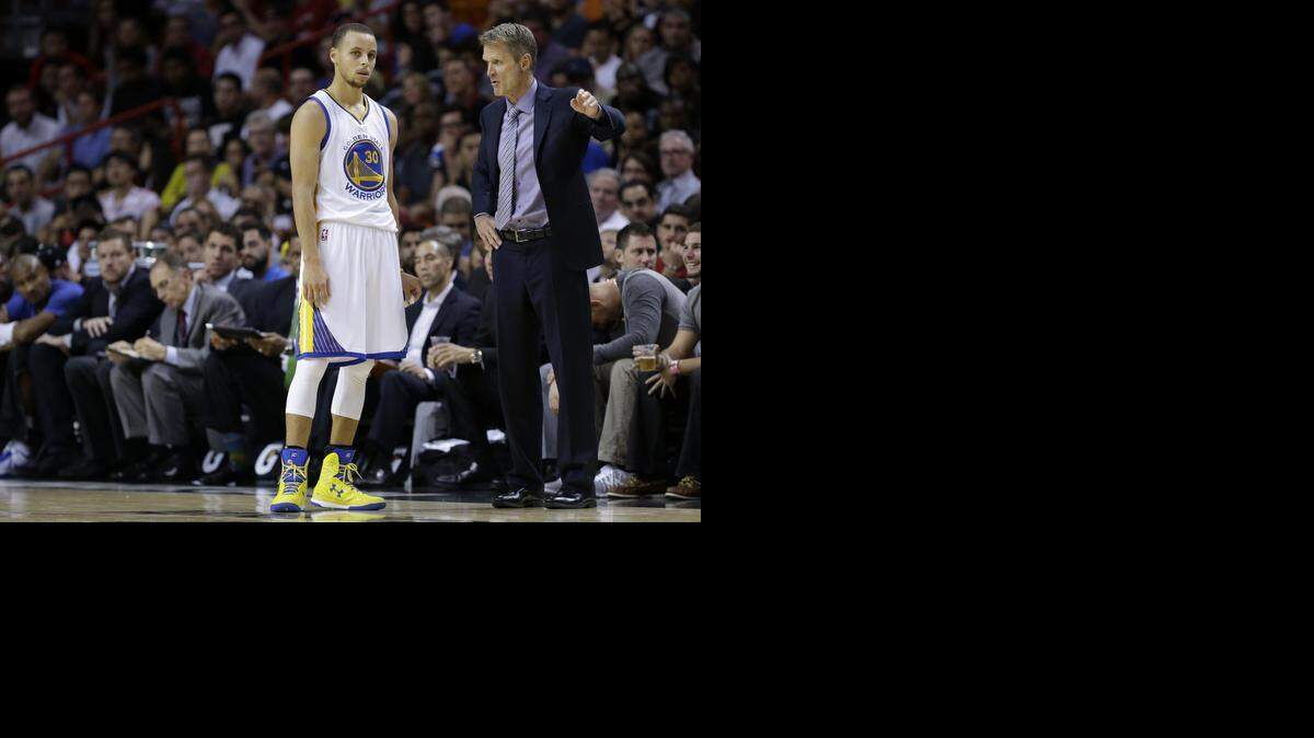 
Golden State guard Stephen Curry, left, and first-year NBA coach Steve Kerr have gotten the Warriors off to a 19-2 start, best in franchise history and third-best in NBA history.


