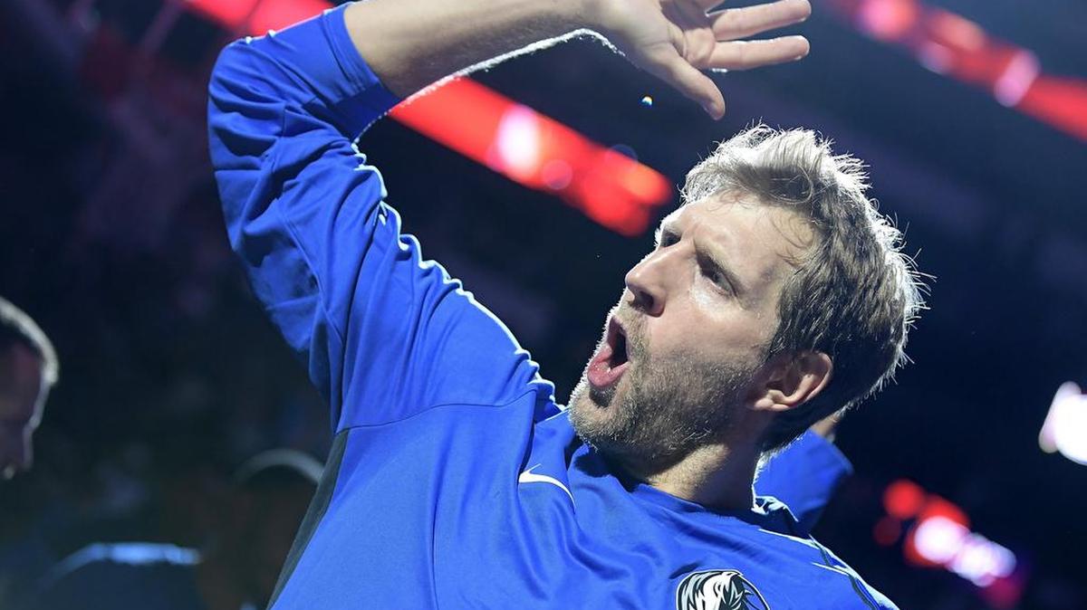 Dallas Mavericks forward Dirk Nowitzki (41) hits the court during the team introductions before the game as they play the Milwaukee Bucks in preseason NBA game Bucks at American Airlines Center in Dallas, Texas, Monday, Oct. 2, 2017.