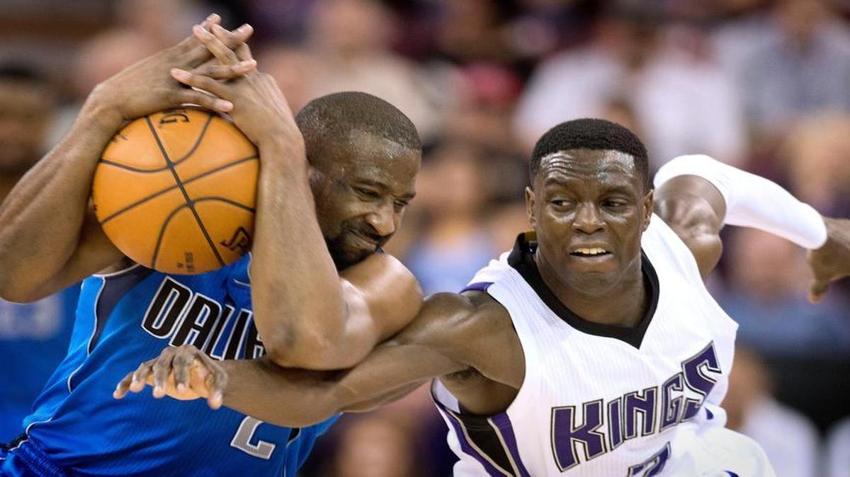 Sacramento Kings guard Darren Collison (7) attempts a steal but Dallas Mavericks guard Raymond Felton (2) maintains possession during the second quarter on Sunday in Sacramento, Calif.