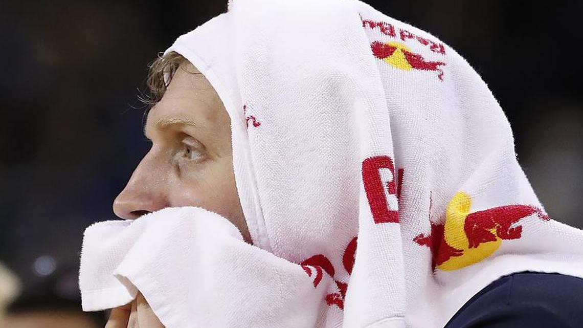 Dallas Mavericks forward Dirk Nowitzki sits on the bench during the second half against the Golden State Warriors in Oakland, Calif., Friday, Dec. 30, 2016. The Warriors won 108-99. Nowitzki played 23 minutes and scored 11 points in his fourth game played since returning from an Achilles injury.