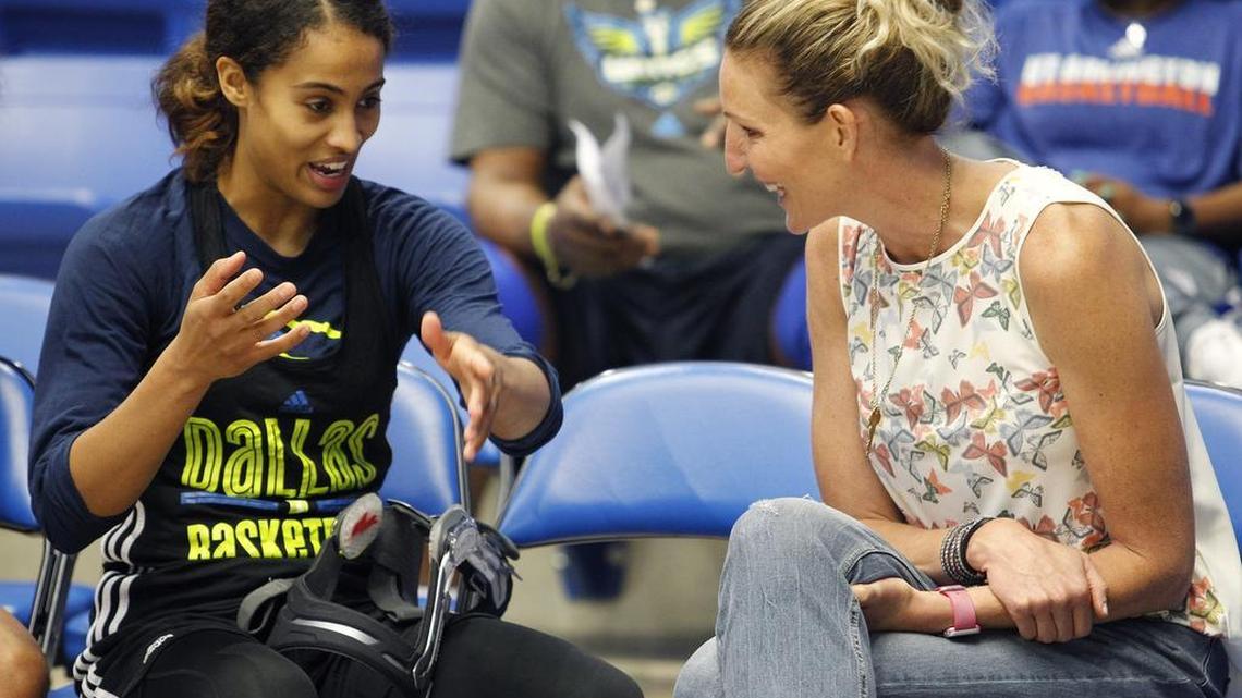 TCU women’s basketball coach Raegan Pebley, right, talks with Skylar Diggins following the Dallas Wings’ practice. Pebley is scheduled to be a color analyst for Wings games this season.