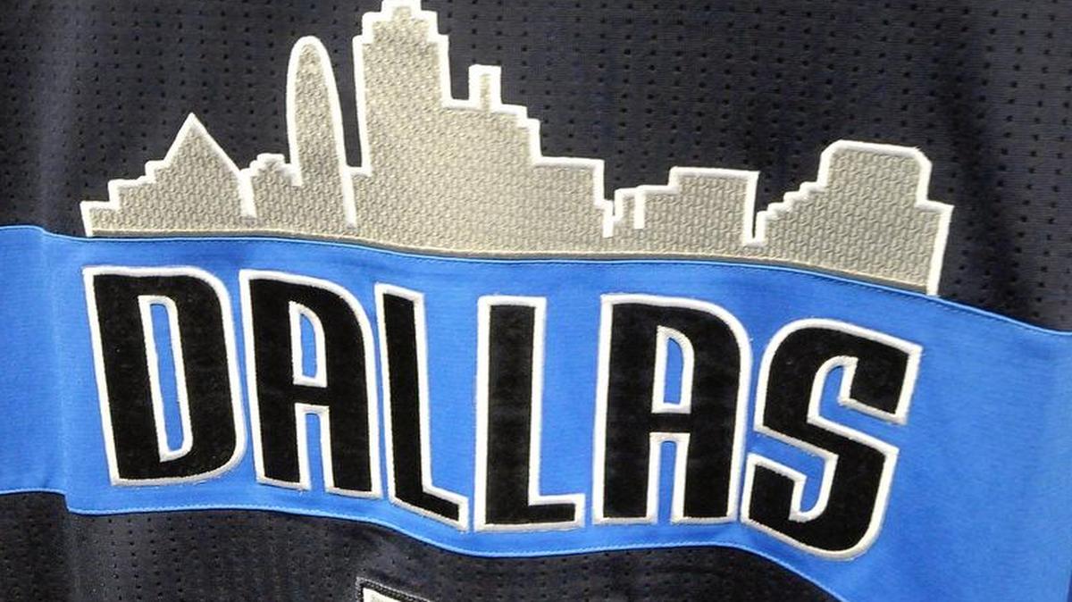 The Mavericks’ new jersey includes the Dallas skyline.
