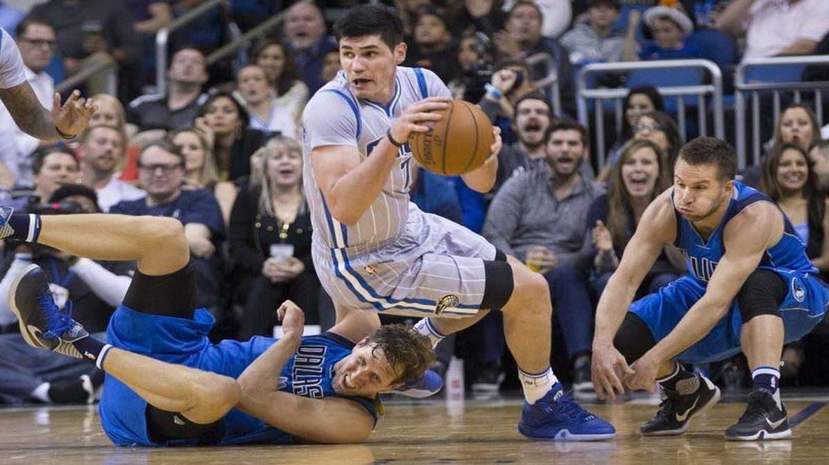 Dirk Nowitzki and the Mavericks couldn’t keep up with Ersan Ilyasova (7) and the Orlando Magic in overtime Friday night.The Magic won 110-104.