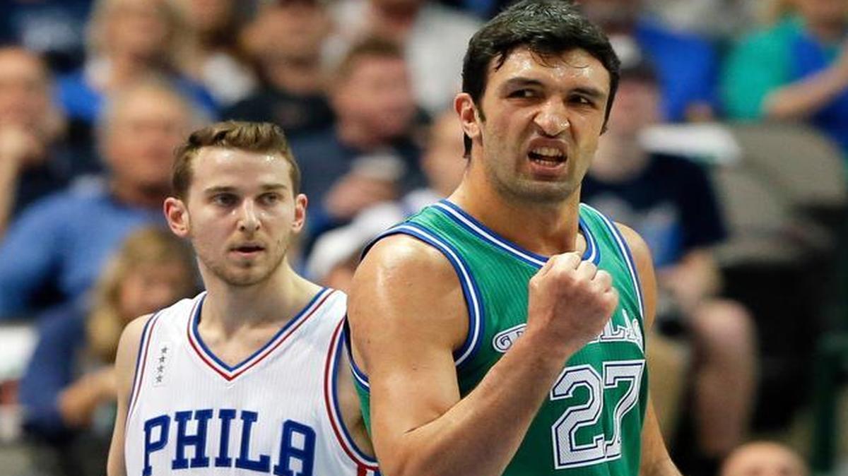 Dallas Mavericks center Zaza Pachulia celebrates hitting a shot in the first half against the Sixers.