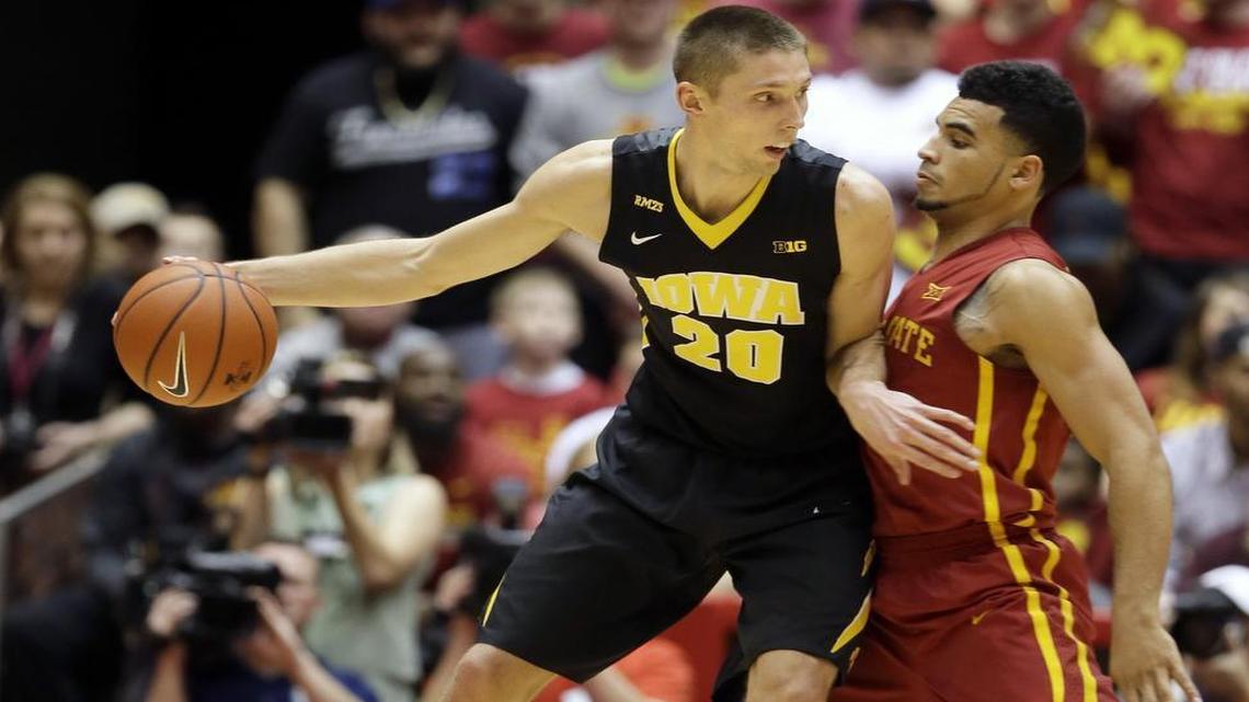 Iowa forward Jarrod Uthoff, left, went undrafted last summer, but has found some stability with the Dallas Mavericks.