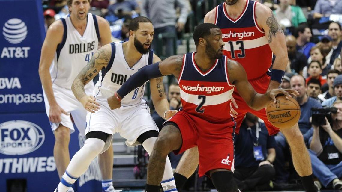 Washington Wizards guard John Wall (2) tries to work the ball towards the basket in the first half against the Dallas Mavericks on Jan. 3 in Dallas.