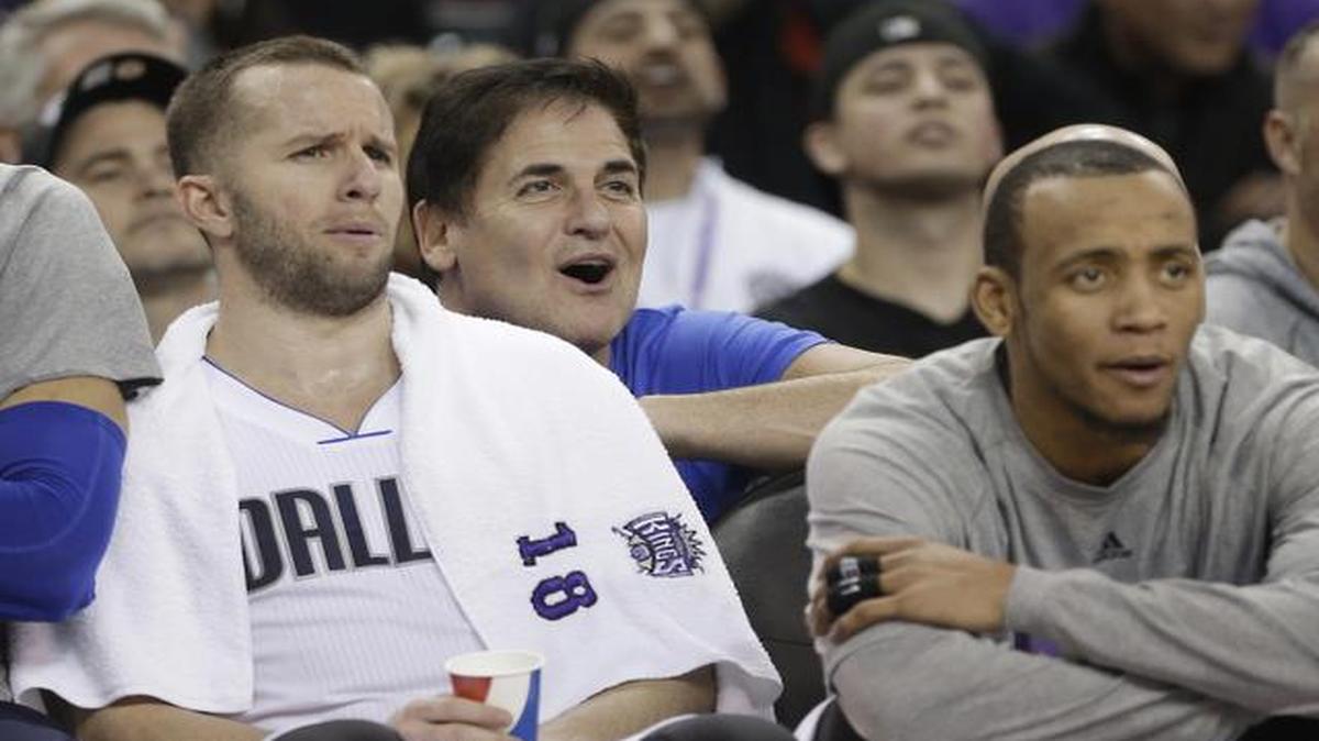 
Dallas Mavericks owner Mark Cuban, center, watches Thursday night’s victory at Sacramento with Maverick guards J.J. Barea, left, and Monta Ellis. Dallas won 101-78. 
