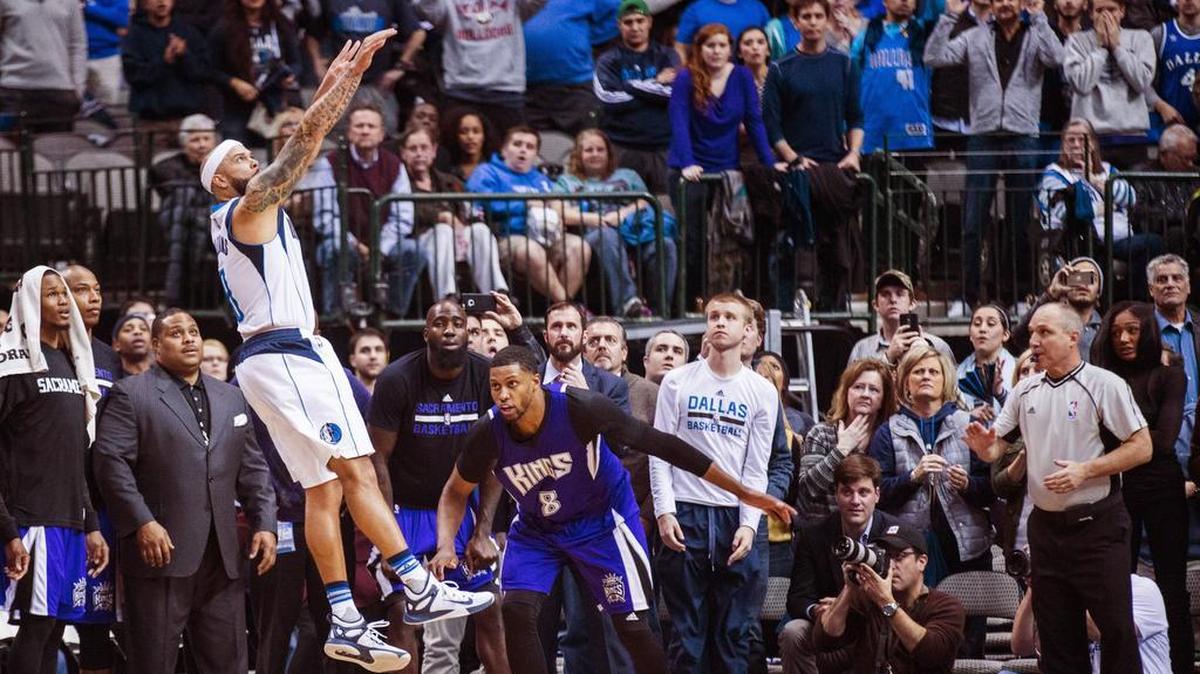 Dallas Mavericks guard Deron Williams shoots the game-winning 3-pointer in the final second of the second overtime to beat Sacramento 117-116 Tuesday night at the American Airlines Center.