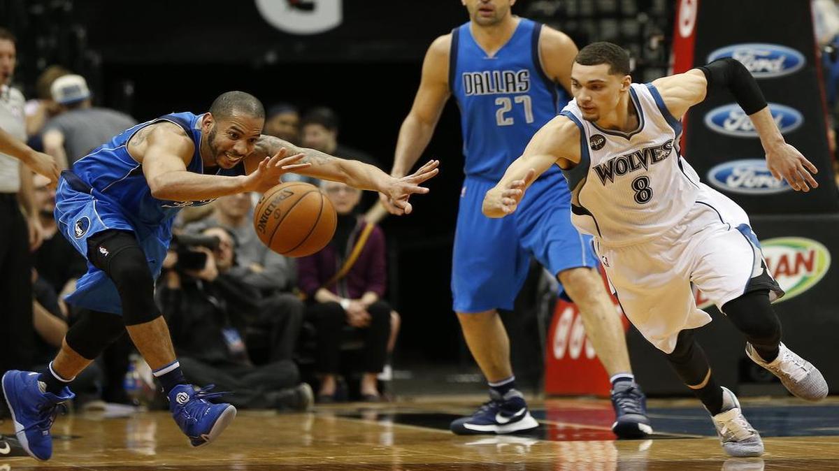 Devin Harris, left, and the Dallas Mavericks beat Zach LaVine and the Minnesota Timberwolves to the ball for most of the game Sunday.