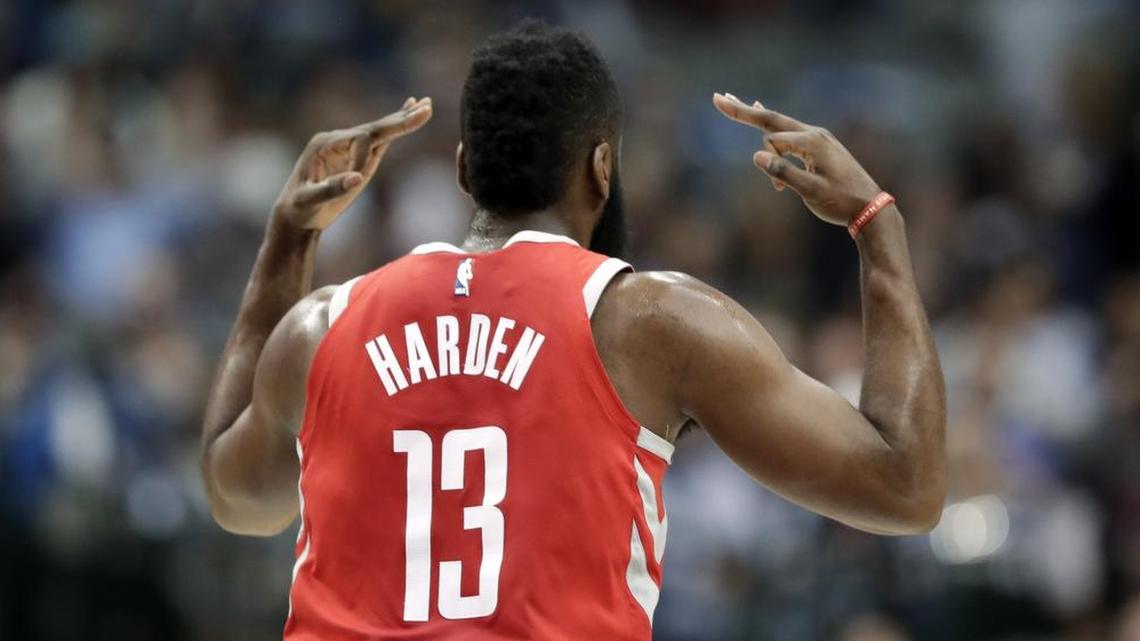 Houston Rockets guard James Harden celebrates sinking a 3-point basket in the first half. Houston made 21-of-51 shots from long distance.