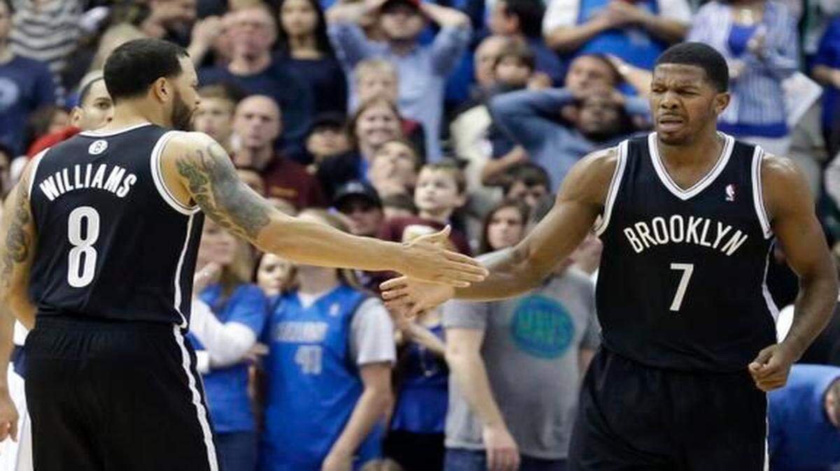 
Guards Deron Williams, left, and Joe Johnson




