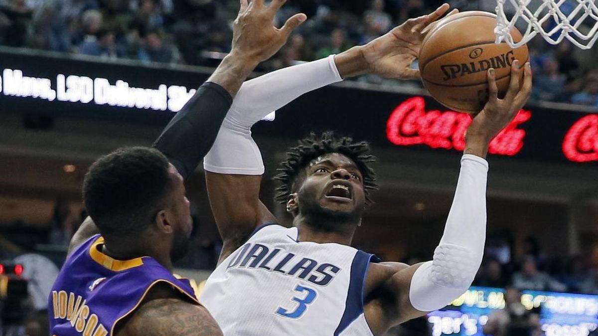 Newly acquired center Nerlens Noel, right, is one of the key building blocks of a suddenly much younger Dallas Mavericks team.