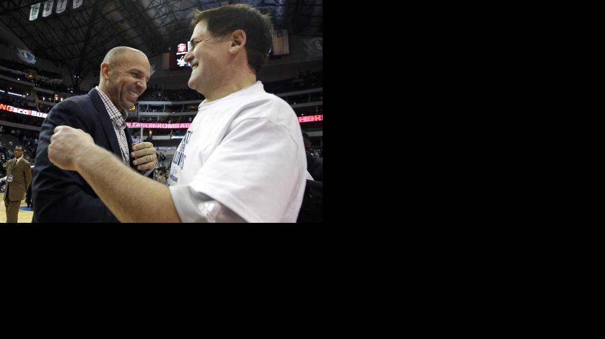 
Milwaukee Bucks head coach Jason Kidd and Dallas Mavericks owner Mark Cuban greet each other after an NBA basketball game Sunday, Dec. 7, 2014, in Dallas. The Mavericks won 125-102. 
