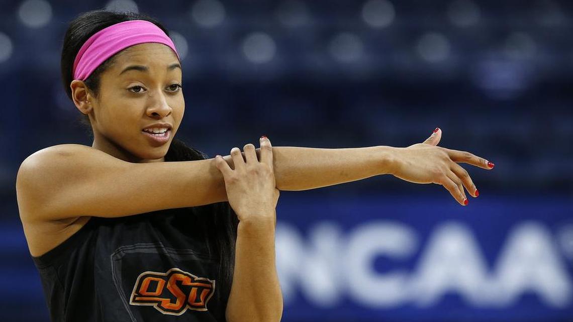 Oklahoma State guard Tiffany Bias stretches during an NCAA women's college basketball tournament practice at the Purcell Pavilion in South Bend, Ind., Friday, March 28, 2014.
