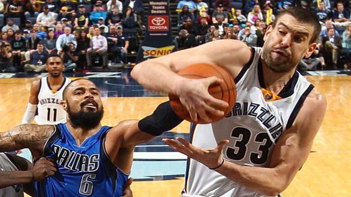 
Grizzlies center Marc Gasol, wrestling a rebound away from the Mavericks’ Tyson Chandler in the teams’ Jan. 19 game in Memphis, averages a team-leading 17.8 points and 7.9 rebounds a game.


