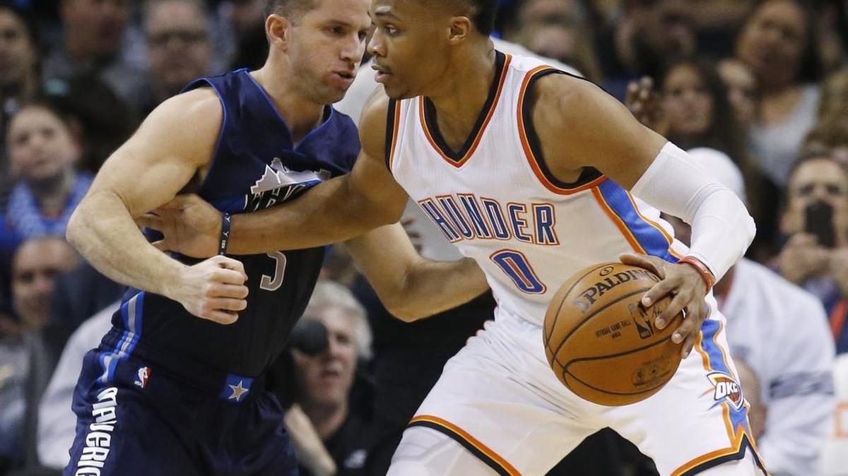Mavericks guard J.J. Barea, left, irritated Thunder guard Russell Westbrook guard into drawing two technical fouls and an ejection. Oklahoma City won 108-89 but Westbrook was held scoreless for just the second time in his NBA career.
