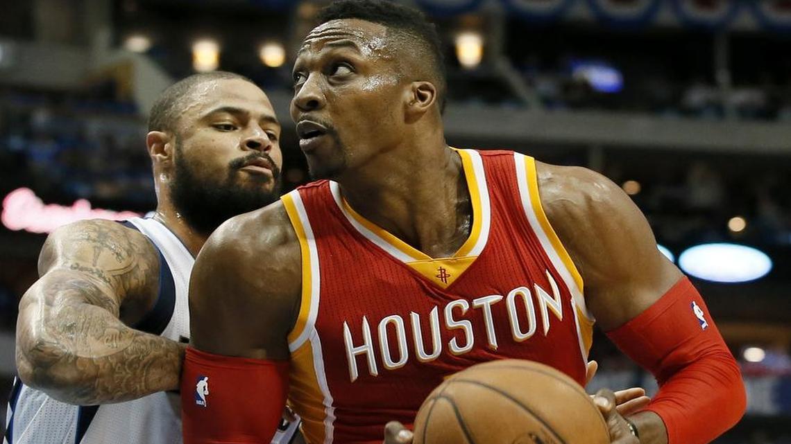 
Tyson Chandler, left, and the more aggressive Mavericks didn’t back down from Dwight Howard and the Rockets in Game 4 on Sunday.


