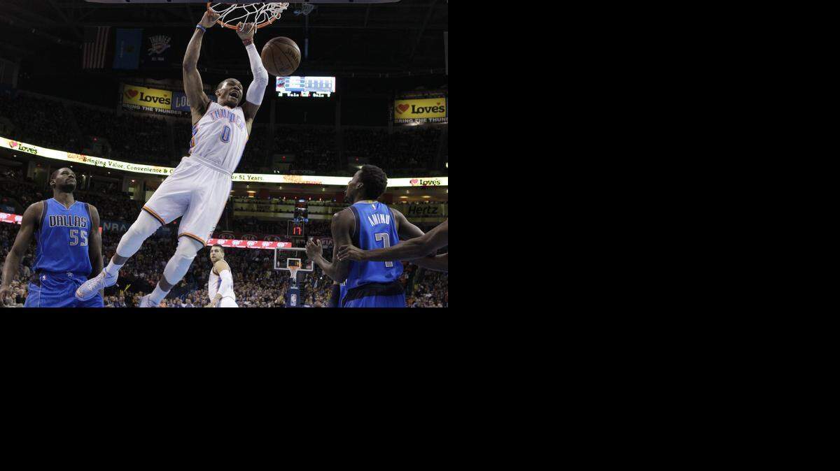 
Russell Westbrook, center, had 34 points, 10 assists and five rebounds to help the Thunder slam the Mavericks 104-89 on Feb. 19 in Oklahoma City.


