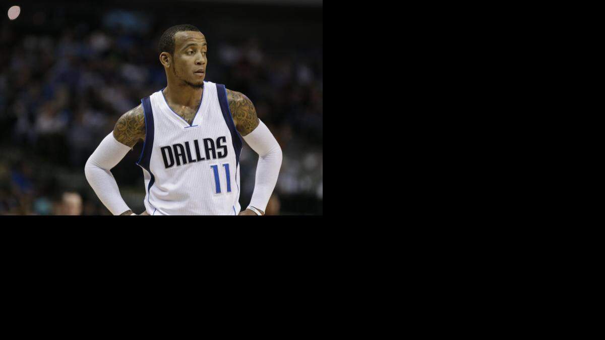 
Dallas Mavericks guard Monta Ellis (11) looks on before a timeout  against the New Orleans Pelicans Wednesday, Dec. 10, 2014, in Dallas. 
