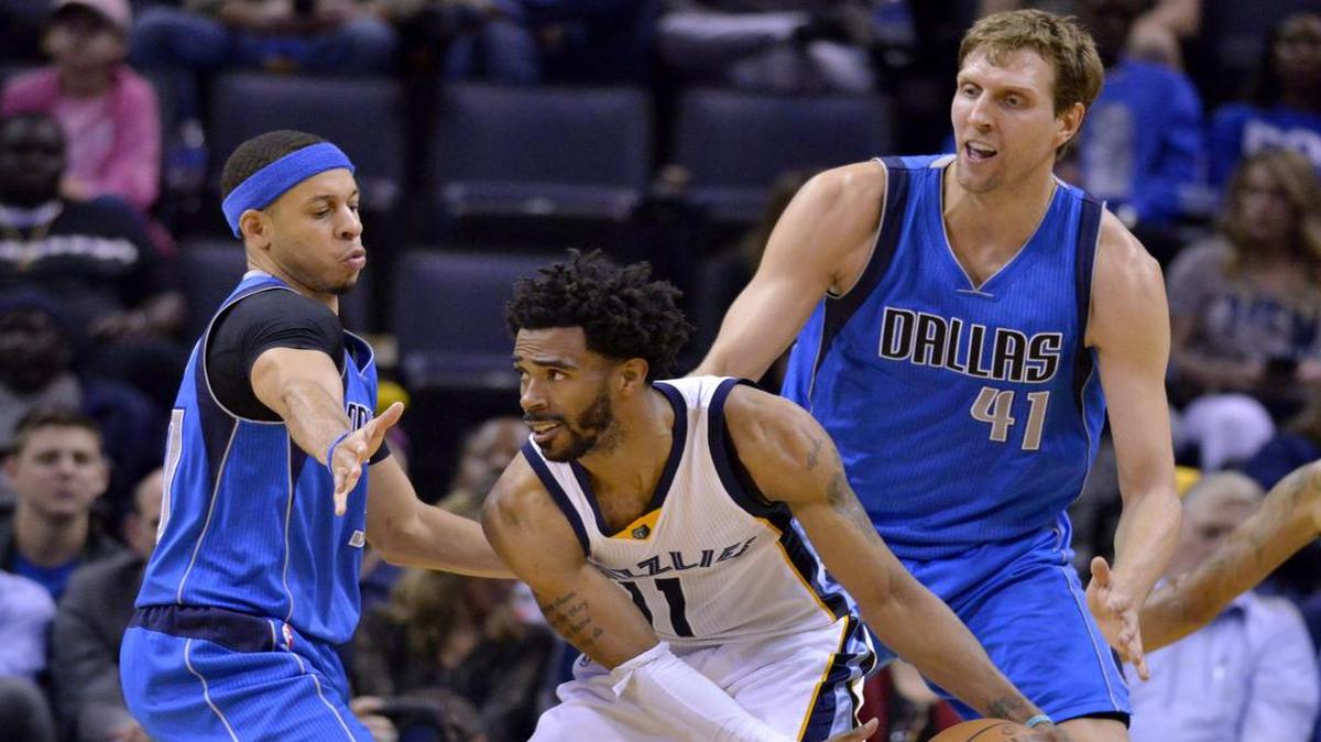 Memphis Grizzlies guard Mike Conley, middle, won’t have to worry about being defensed by Dallas Mavericks Seth Curry, left, and Dirk Nowitzki in Wednesday’s regular-season finale. The two Mavericks aren’t expected to play.