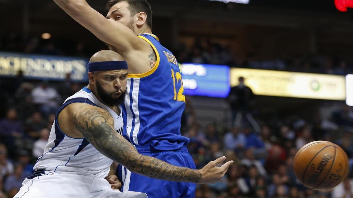 The Dallas Mavericks and guard Deron Williams, left, are trying to find any way around Andrew Bogut, the Golden State Warriors and their NBA foes. Dallas is clinging to a playoff spot.
