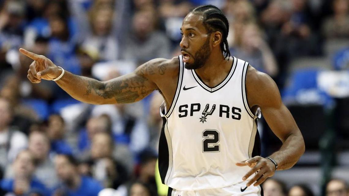 San Antonio Spurs forward Kawhi Leonard made his regular-season debut on Thursday night, scoring 13 points in 16 minutes, but his team lost to the Mavericks, 95-89.