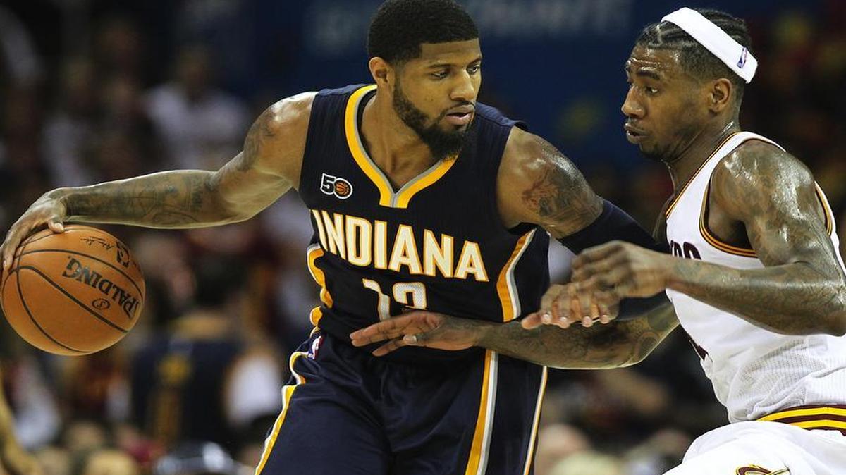 Indiana Pacers forward Paul George works against Cleveland Cavaliers guard Iman Shumpert during in Game 2 of an Eastern Conference playoff game last season in Cleveland, Ohio. On Friday, June 30, George was traded to the Oklahoma City Thunder, according to Associated Press sources.