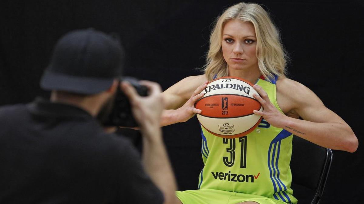 Erin Phillips (31) poses for team photographer Layne Murdoch, Jr. The new WNBA Dallas WIngs basektball team held their first media day at their home base at UTA in Arlington, Thursday, May 5, 2016.