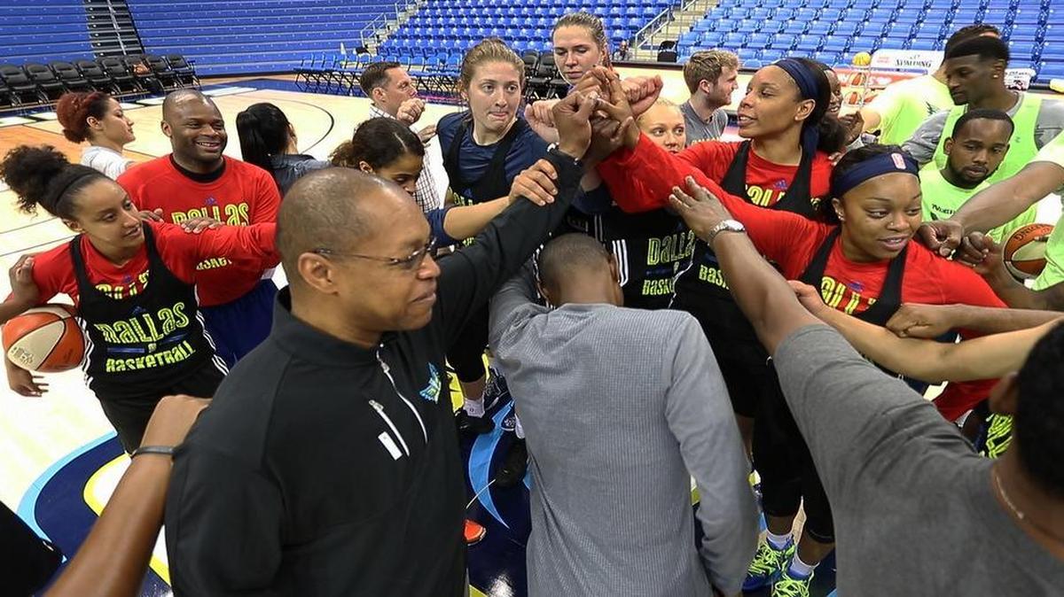 Fred Williams, left, with glasses, of the Dallas Wings is one of seven male head coaches in the WNBA.
