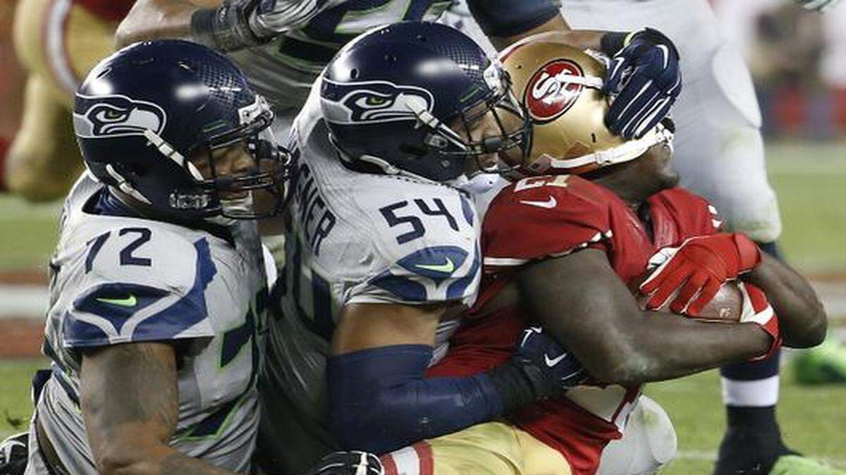 
Michael Bennett, left, Bobby Wagner and the Seahawks’ defense are crushing it.



