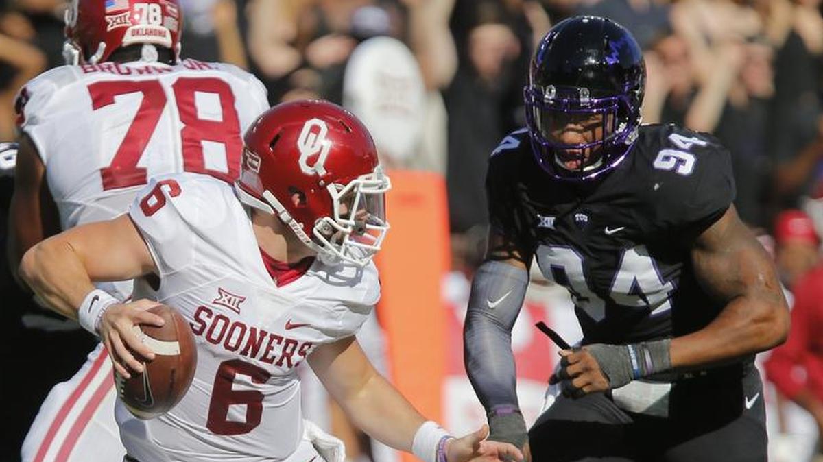 Defensive end Josh Carraway pressures Baker Mayfield for the TCU Horned Frogs in 2016. Carraway is now one of several DFW-area players on an NFL roster this postseason.