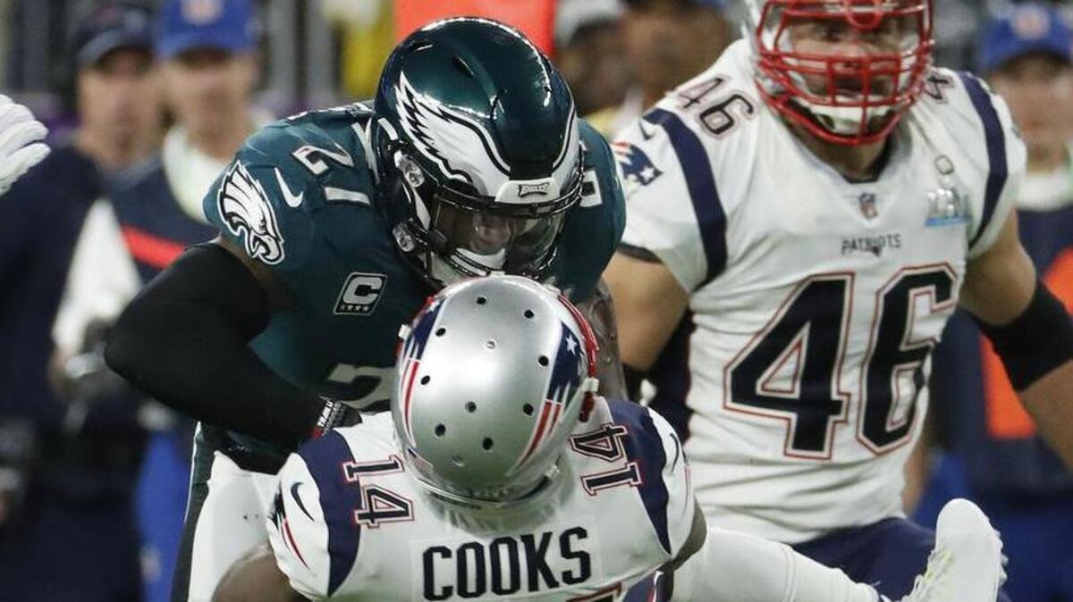Eagles’ safety Malcolm Jenkins, top, hits Patriots’ receiver Brandin Cooks during the second quarter of Super Bowl 52. Cooks missed the rest of the game with a head injury.