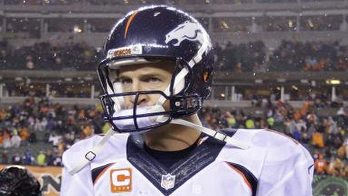
Denver Broncos quarterback Peyton Manning (18) walks off the field after Monday’s loss to Cincinnati. Cincinnati won 37-28. 
