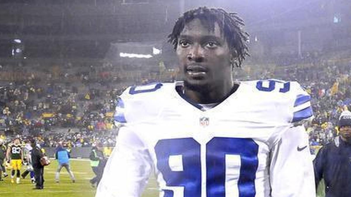 Dallas Cowboys defensive end Demarcus Lawrence (90) heads to the locker room after the Green Bay Packers beat the Dallas Cowboys play 28-7 last season. Lawrence is facing a four-game suspension to start the 2016 season.