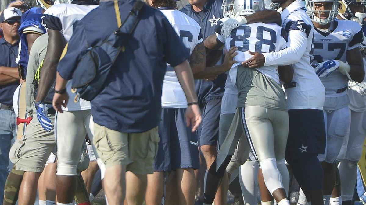 
Dallas Cowboys wide receiver Dez Bryant (88) runs over from the other practice field to jump in the fight during the joint Cowboys and Rams practice at Cowboys Training Camp in Oxnard, CA, Tuesday, Aug. 18, 2015. 
