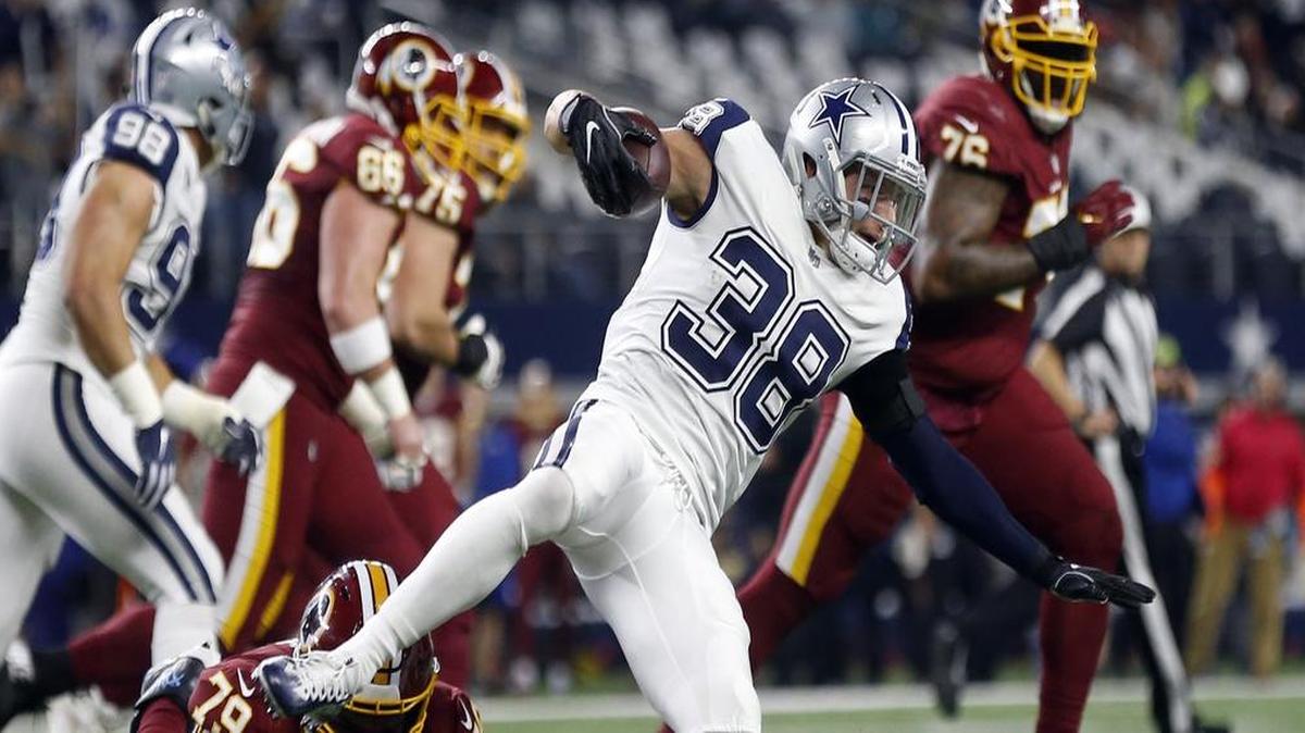Washington Redskins offensive tackle Ty Nsekhe makes the stop after Dallas Cowboys safety Jeff Heath intercepted a pass from quarterback Kirk Cousins.