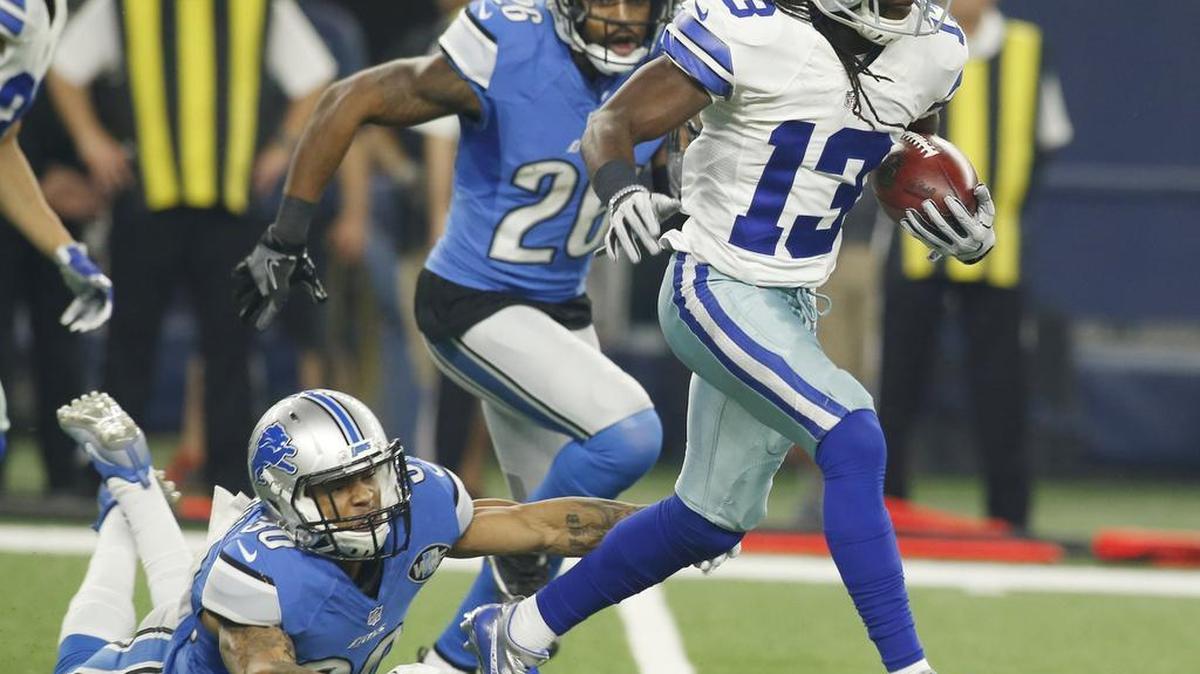 Dallas Cowboys wide receiver Lucky Whitehead (13) eludes defenders on a first half kick off return against the Detroit Lions in Arlington, Texas on Sunday, December 26, 2016.
