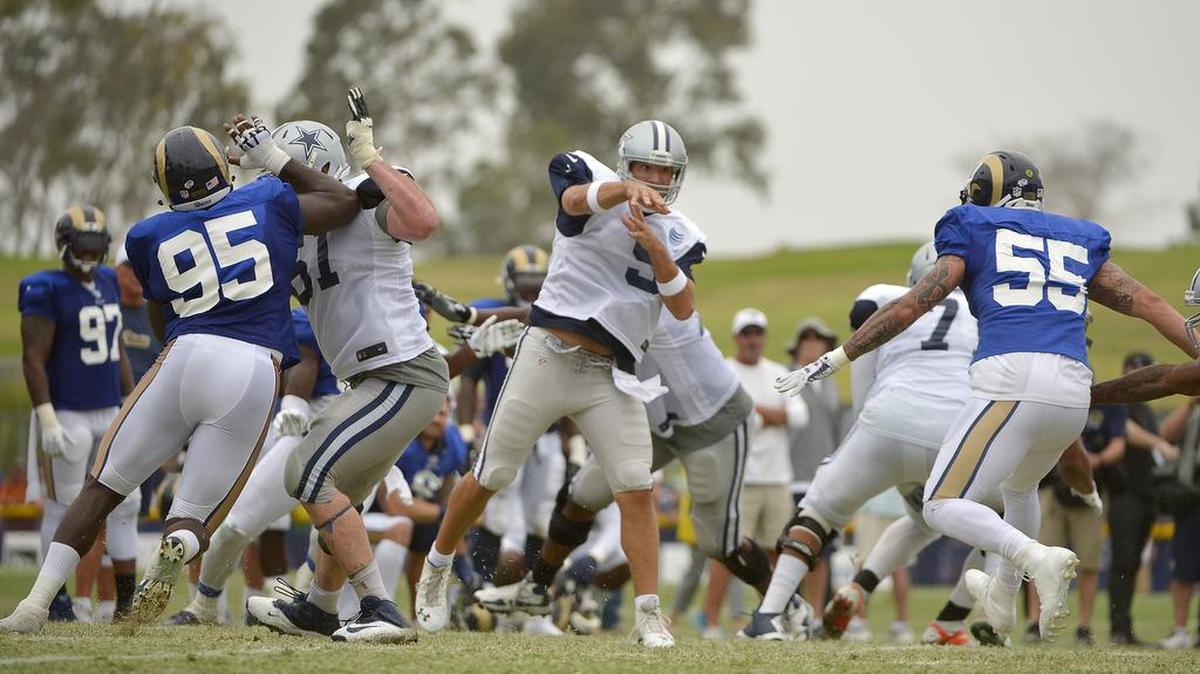 
Dallas Cowboys quarterback Tony Romo (9) will practice a second straight day against the Rams and fourth straight day in camp for the first time in more than a year. 
