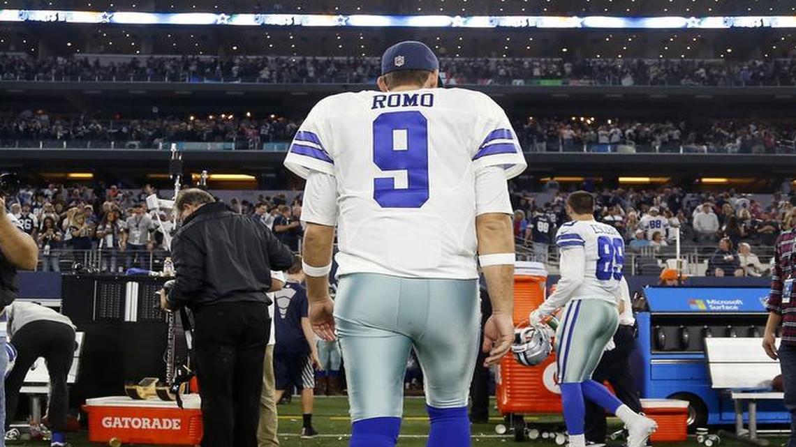 Dallas Cowboys quarterback Tony Romo walks off the field after a game against the Detroit Lions at A&T Stadium in Arlington, Texas on Monday, Dec. 26, 2016. Should Romo just walk away from football entirely?