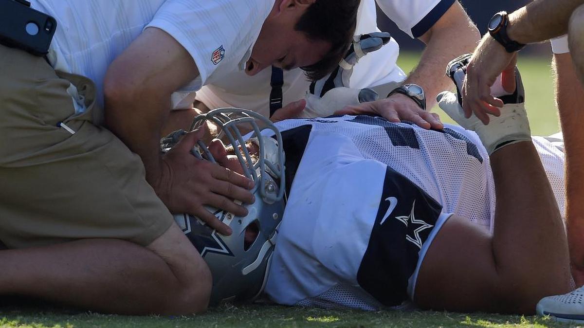 
Medical staff tends to Dallas Cowboys guard Zack Martin during Tuesday’s practice. Martin was diagnosed with a stinger.
