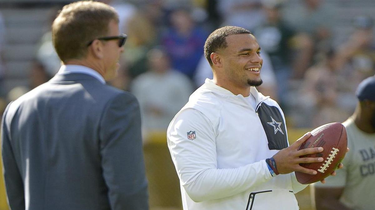Fox sports caster and former Dallas Cowboys great Troy Aikman got a close look at rookie Dak Prescott on Sunday against Green Bay.